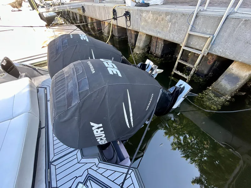 Slide: The Image of 2021 Cruisers Yachts 338 South Beach Edition with Mercury outboard engines at dock. - 42