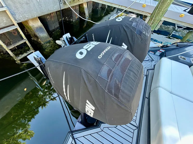 Slide: The Image of 2021 Cruisers Yachts 338 South Beach Edition Bow Rider with covered outboard motors. - 43