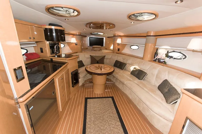 Slide: The Image of Interior of 2009 Larson Cabrio 330 Day Cruiser, luxurious design. - 11