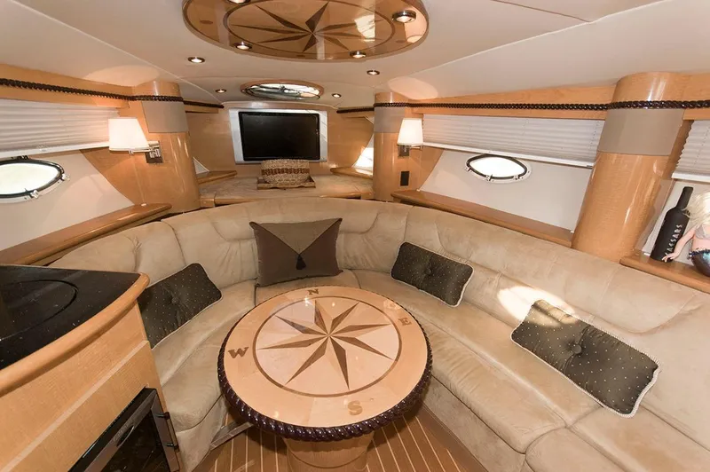 Slide: The Image of Interior of 2009 Larson Cabrio 330 Day Cruiser with luxurious design. - 12