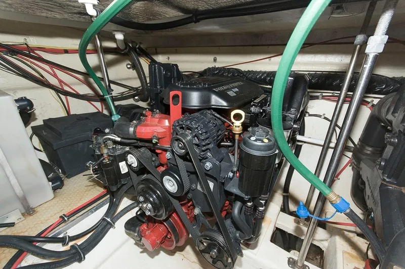 Slide: The Image of Engine compartment of Larson Cabrio 330 Day Cruiser 2009. - 18