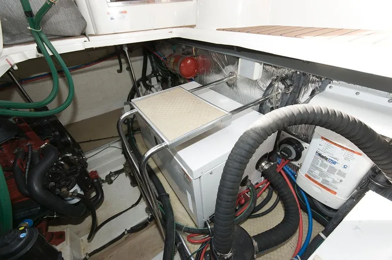 Slide: The Image of Engine room of 2009 Larson Cabrio 330 Day Cruiser. - 19