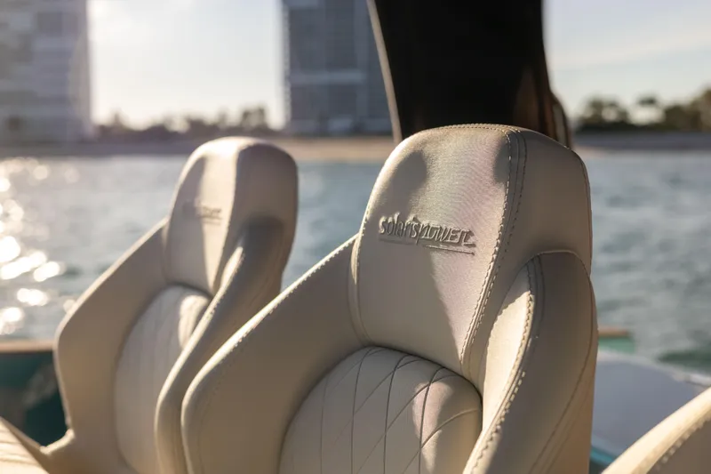 Slide: The Image of Luxurious seats on the 2024 Solaris Power 52 Open yacht, with ocean backdrop. - 21