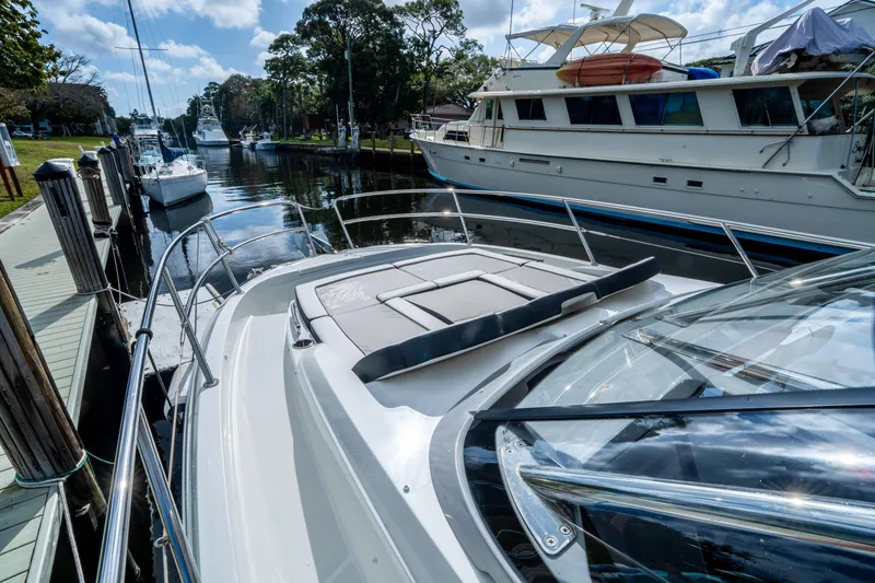 Slide: The Image of 2024 Jeanneau Leader 10.5 WA Series 2 docked, showcasing sleek design and spacious deck. - 15