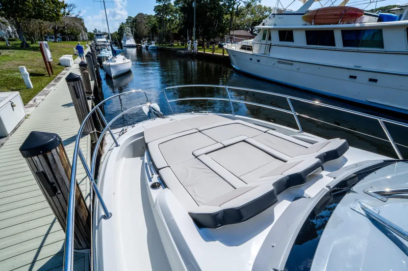 Slide: The Image of 2024 Jeanneau Leader 10.5 WA Series 2 docked, featuring spacious sunbathing area. - 19