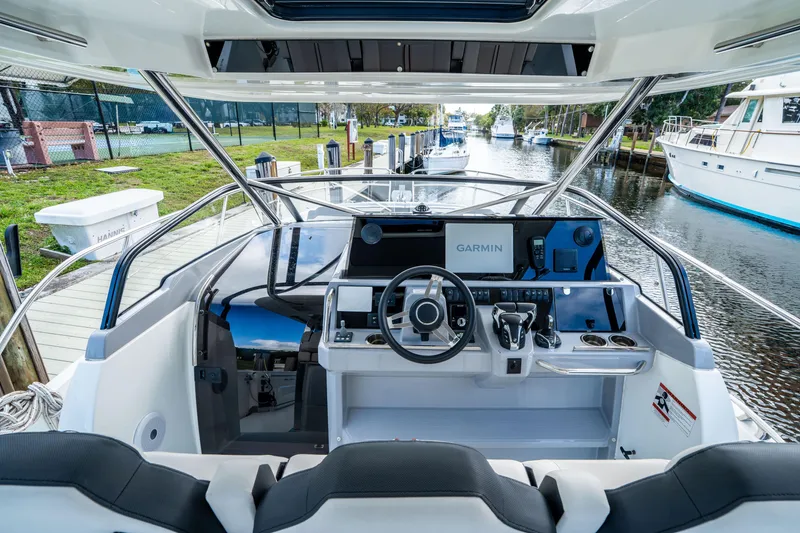 Slide: The Image of 2024 Jeanneau Leader 10.5 WA Series 2 cockpit with Garmin navigation system. - 24
