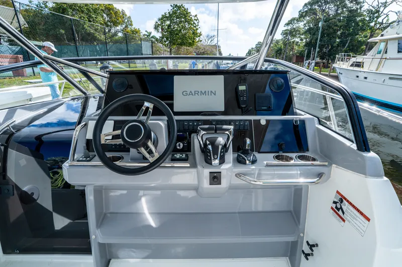 Slide: The Image of 2024 Jeanneau Leader 10.5 WA Series 2 helm with Garmin navigation system. - 25