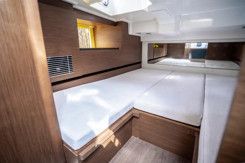 Slide: The Image of 2024 Jeanneau Leader 10.5 WA Series 2 cabin interior with modern wood finish. - 43