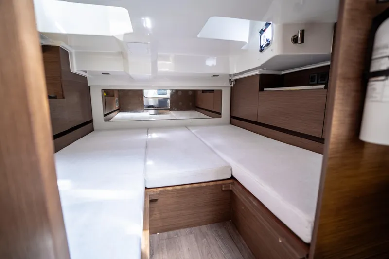 Slide: The Image of Interior cabin of 2024 Jeanneau Leader 10.5 WA Series 2 with modern wood finish. - 44