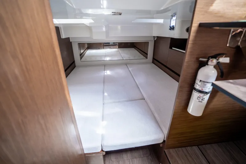 Slide: The Image of Interior cabin of 2024 Jeanneau Leader 10.5 WA Series 2 with bed and fire extinguisher. - 46