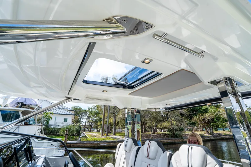 Slide: The Image of 2024 Jeanneau Leader 10.5 WA Series 2 interior with sunroof and modern seating. - 49