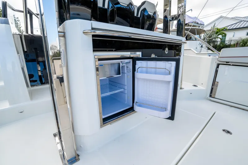 Slide: The Image of Open refrigerator on 2024 Jeanneau Leader 10.5 WA Series 2 boat deck. - 59
