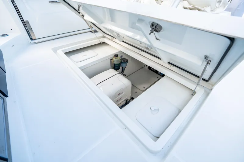 Slide: The Image of Open storage compartment on 2024 Jeanneau Leader 10.5 WA Series 2 boat. - 71