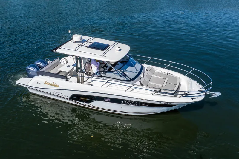 Slide: The Image of 2024 Jeanneau Leader 10.5 WA Series 2 boat cruising on water. - 9