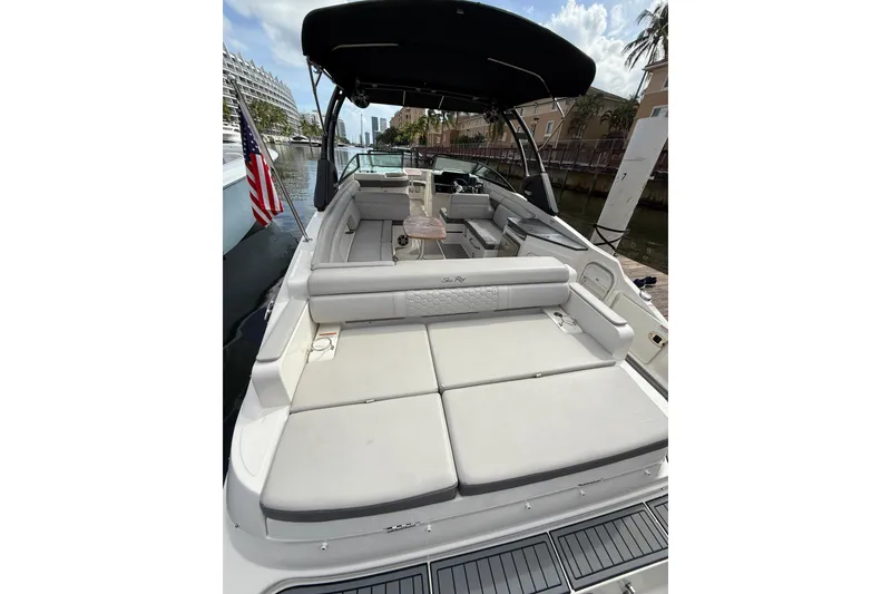 Slide: The Image of 2021 Sea Ray SDX 290 Outboard boat with spacious seating and sleek design. - 40