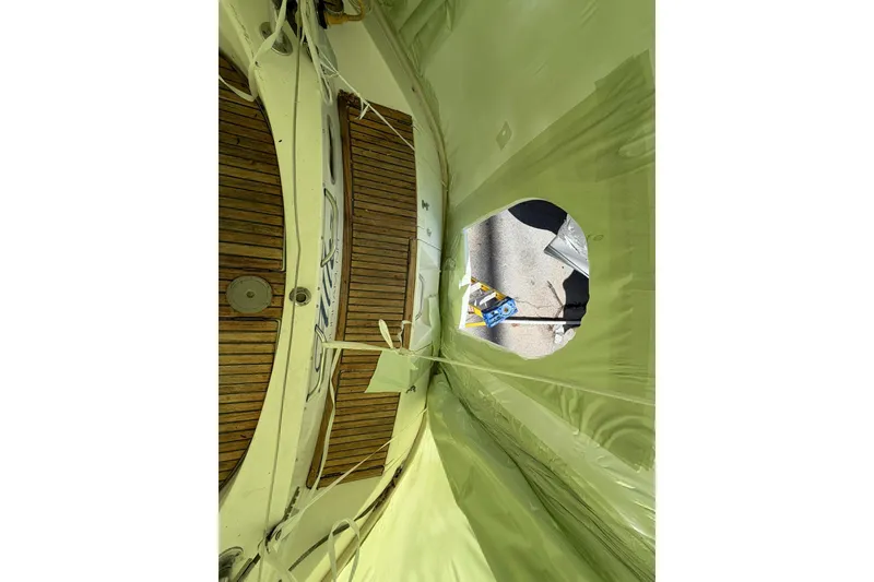 Slide: The Image of Interior view of a 1990 Beneteau Oceanis 430 sailboat under renovation. - 15