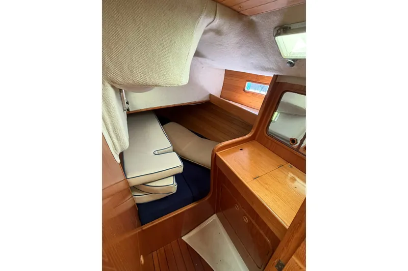 Slide: The Image of Cozy cabin interior of 1990 Beneteau Oceanis 430 sailboat with wooden finish. - 8