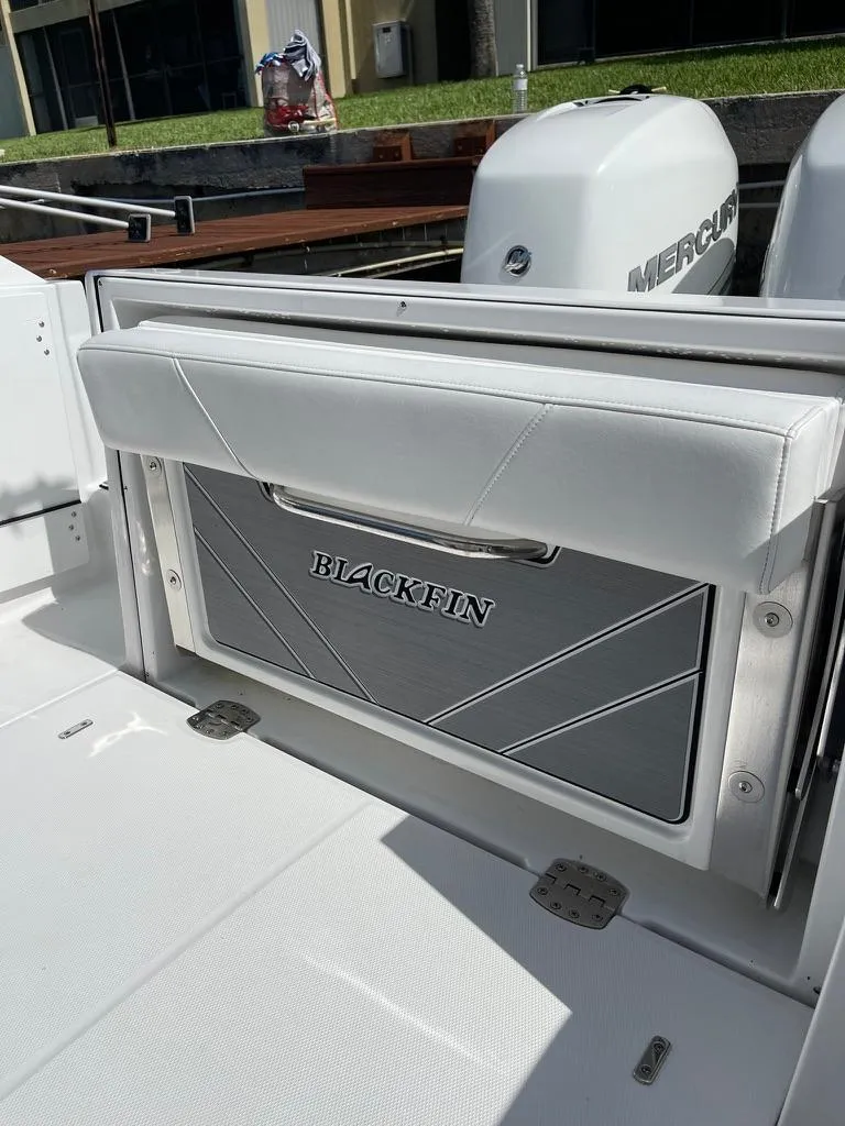Slide: The Image of 2019 Blackfin 272 CC boat with Mercury engines, featuring sleek design and modern amenities. - 7