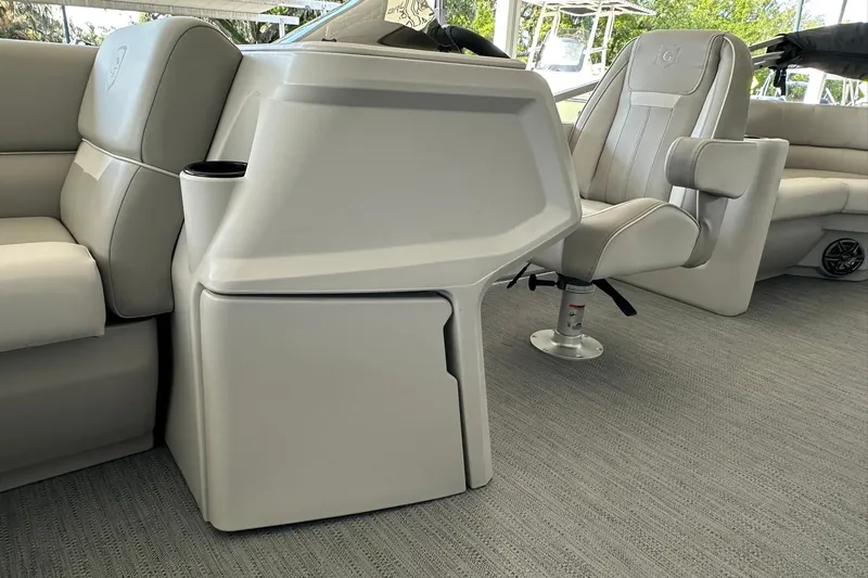 Slide: The Image of Interior of 2026 Sweetwater EX2286SBX boat with modern seating and console design. - 17