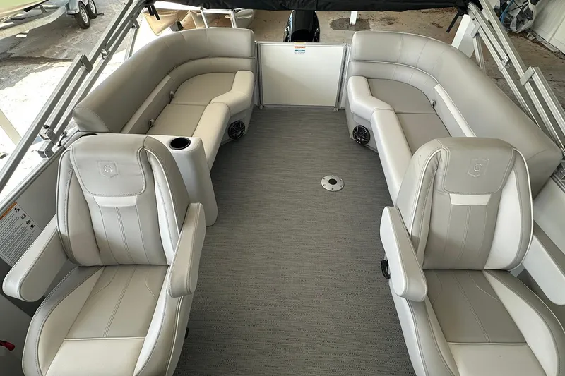 Slide: The Image of Interior of 2026 Sweetwater EX2286SBX pontoon boat with plush seating and modern design. - 20