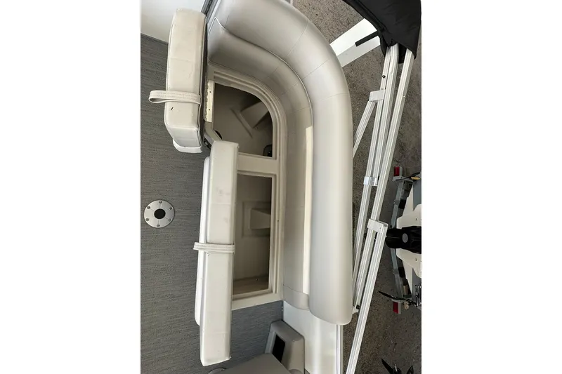 Slide: The Image of Interior seating of 2026 Sweetwater EX2286SBX pontoon boat with storage compartments. - 22