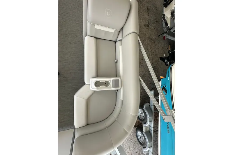 Slide: The Image of Luxurious seating on 2026 Sweetwater EX2286SBX pontoon boat with cup holders. - 5
