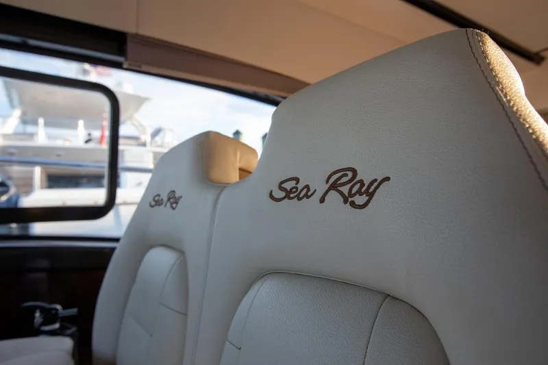 Slide: The Image of Luxurious interior seating of 2018 Sea Ray Sundancer 400 yacht, featuring elegant embroidery. - 11