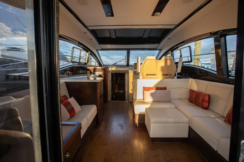 Slide: The Image of Luxurious interior of 2018 Sea Ray Sundancer 400 yacht with elegant seating and wood flooring. - 8