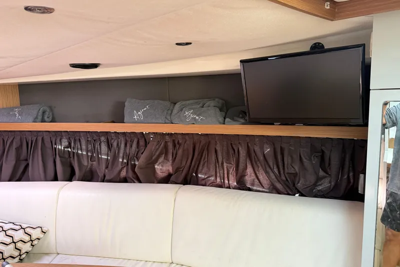 Slide: The Image of Interior of 2014 Azimut Atlantis 34 yacht with TV and cozy seating area. - 10