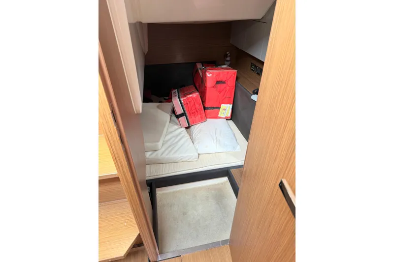 Slide: The Image of Interior cabin of 2014 Azimut Atlantis 34 yacht with red storage bags. - 15