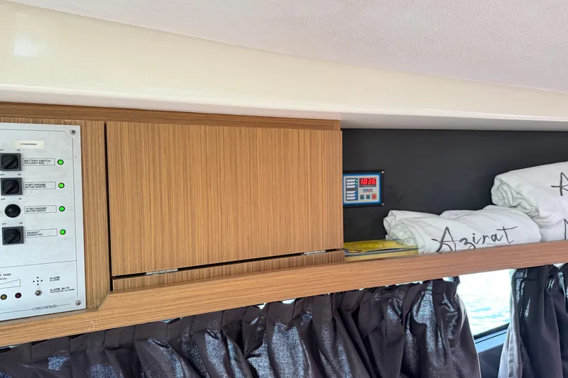 Slide: The Image of Interior of 2014 Azimut Atlantis 34 yacht with control panel and storage. - 7