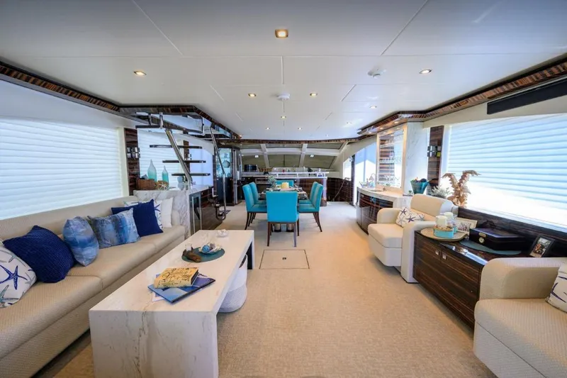 Slide: The Image of Luxurious interior of 2014 Hampton Fly yacht with elegant seating and dining area. - 10