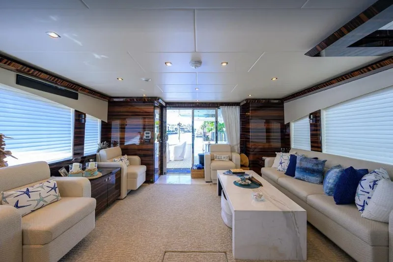Slide: The Image of Luxurious interior of a 2014 Hampton Fly yacht with elegant seating and decor. - 11