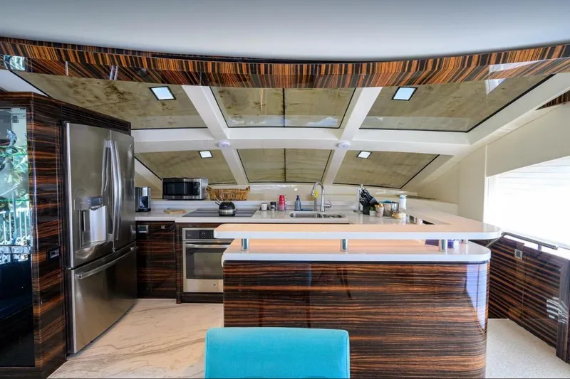 Slide: The Image of Luxurious kitchen interior on 2014 Hampton Fly yacht with modern appliances and sleek design. - 12