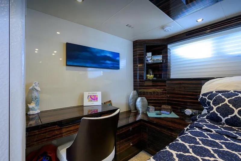 Slide: The Image of Luxurious 2014 Hampton Fly yacht interior with elegant wood finish and modern decor. - 18