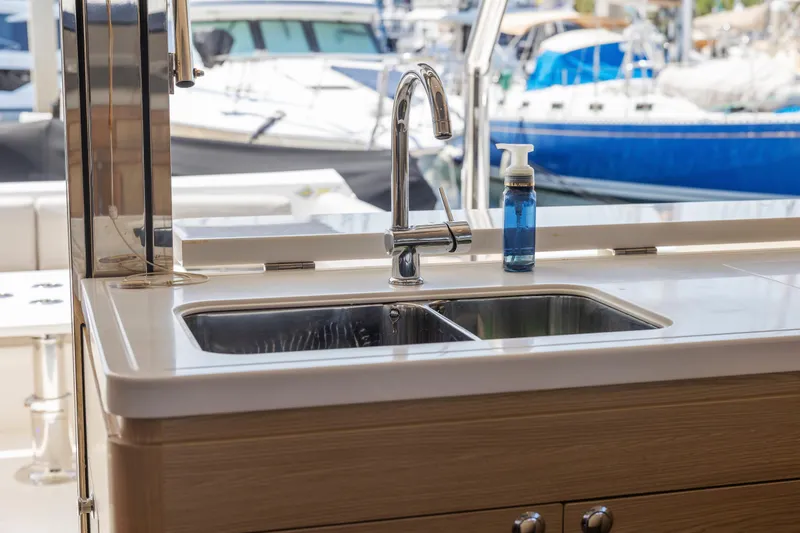 Slide: The Image of Bow view of 2022 Aquila 44 Yacht with stainless steel railings. - 10