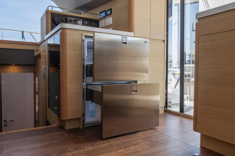 Slide: The Image of Aquila 44 Yacht 2022 docked, showcasing sleek design and luxurious interior. - 12