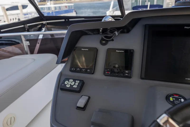 Slide: The Image of Helm of 2022 Aquila 44 Yacht with Raymarine navigation displays. - 49