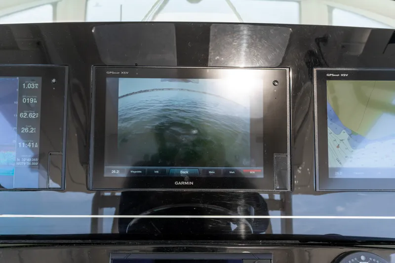 Slide: The Image of Dashboard of 2020 Scout 355 LXF with Garmin GPS displays. - 14