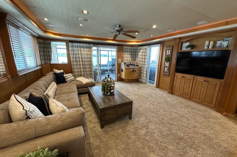 Slide: The Image of Luxurious 2008 Starlite 18x85 houseboat interior with cozy living area and modern decor. - 4