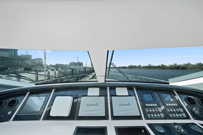Slide: The Image of Cockpit view of 2010 Mangusta 72 Express yacht with Garmin navigation systems. - 15
