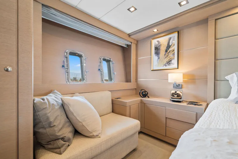 Slide: The Image of Luxurious interior of 2010 Mangusta 72 Express yacht with elegant furnishings and decor. - 31