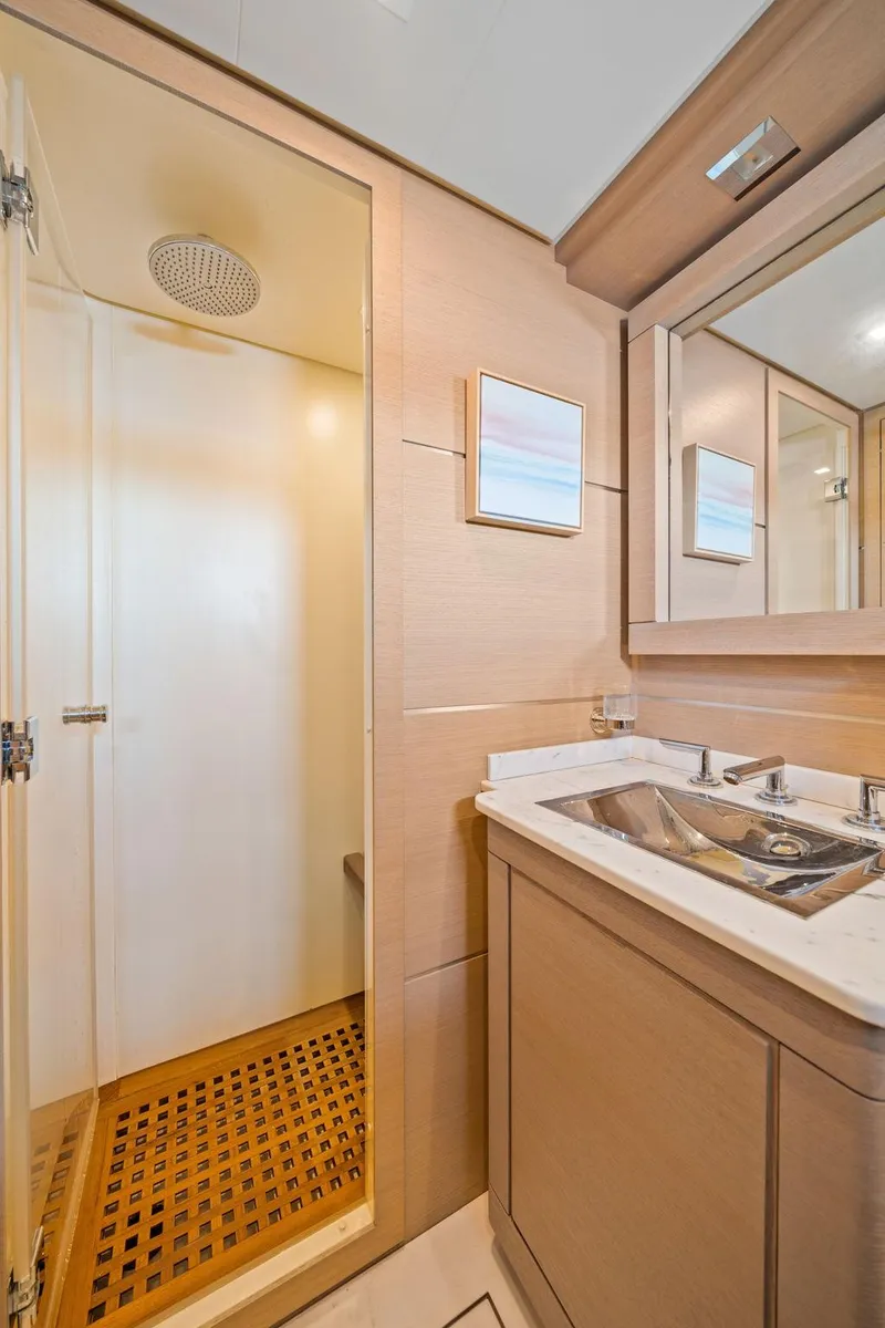 Slide: The Image of Luxurious bathroom in 2010 Mangusta 72 Express yacht with modern fixtures and spacious shower. - 34