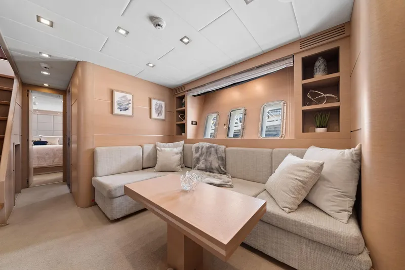 Slide: The Image of Luxurious interior of 2010 Mangusta 72 Express yacht with elegant seating and decor. - 38