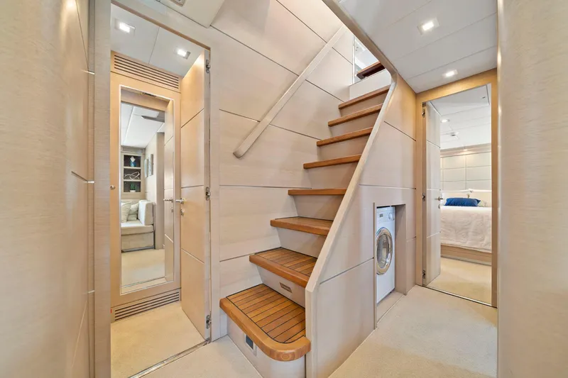 Slide: The Image of Interior of 2010 Mangusta 72 Express yacht with wooden stairs and modern design. - 41