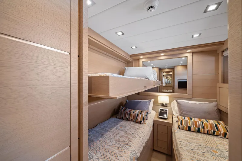 Slide: The Image of Luxurious cabin interior of 2010 Mangusta 72 Express yacht with modern bunk beds. - 43