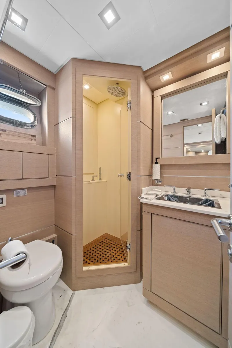 Slide: The Image of Luxurious bathroom in 2010 Mangusta 72 Express yacht with modern fixtures and shower. - 46