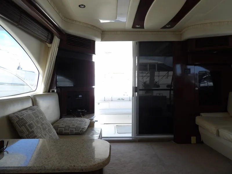 Slide: The Image of Interior of 2008 Sea Ray 44 Sedan Bridge yacht, featuring luxurious seating and modern design. - 20
