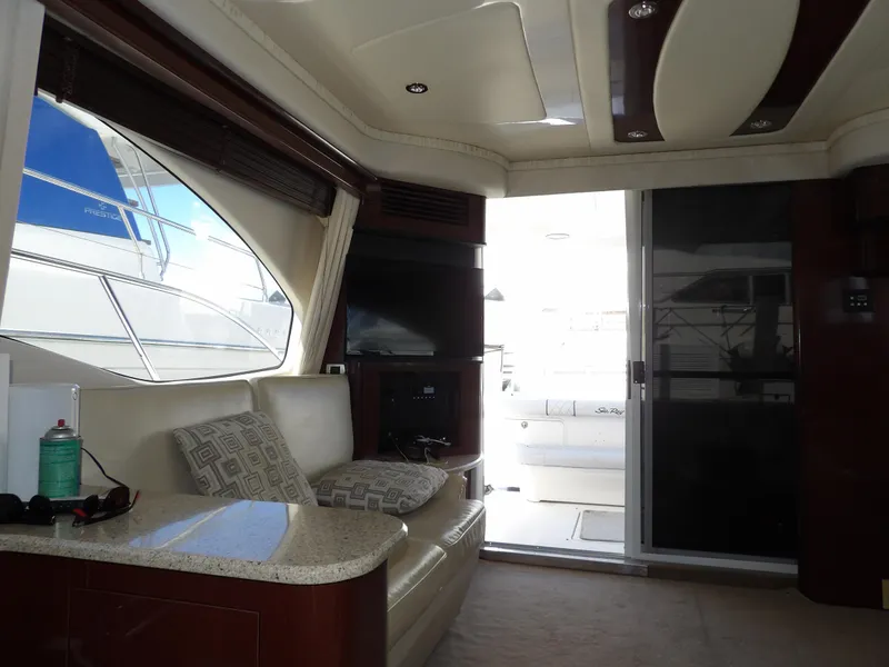 Slide: The Image of Interior of 2008 Sea Ray 44 Sedan Bridge yacht, featuring luxurious seating and modern design. - 21