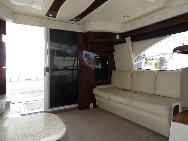Slide: The Image of Luxurious interior of 2008 Sea Ray 44 Sedan Bridge yacht with cream leather seating. - 22